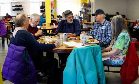 Diners share a meal at Meals on Wheels People's Belmont Center congregate lunch